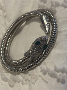 Vintage Silver Snake Coil Bracelet with Green Eye Accents